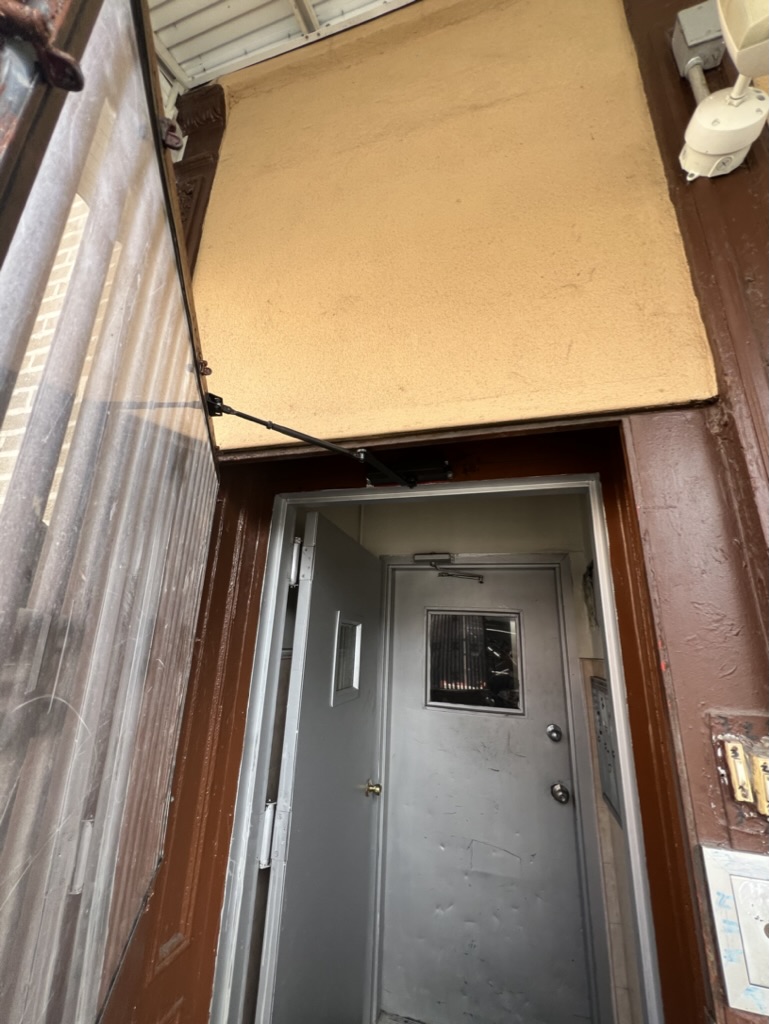 Custom arched door installation